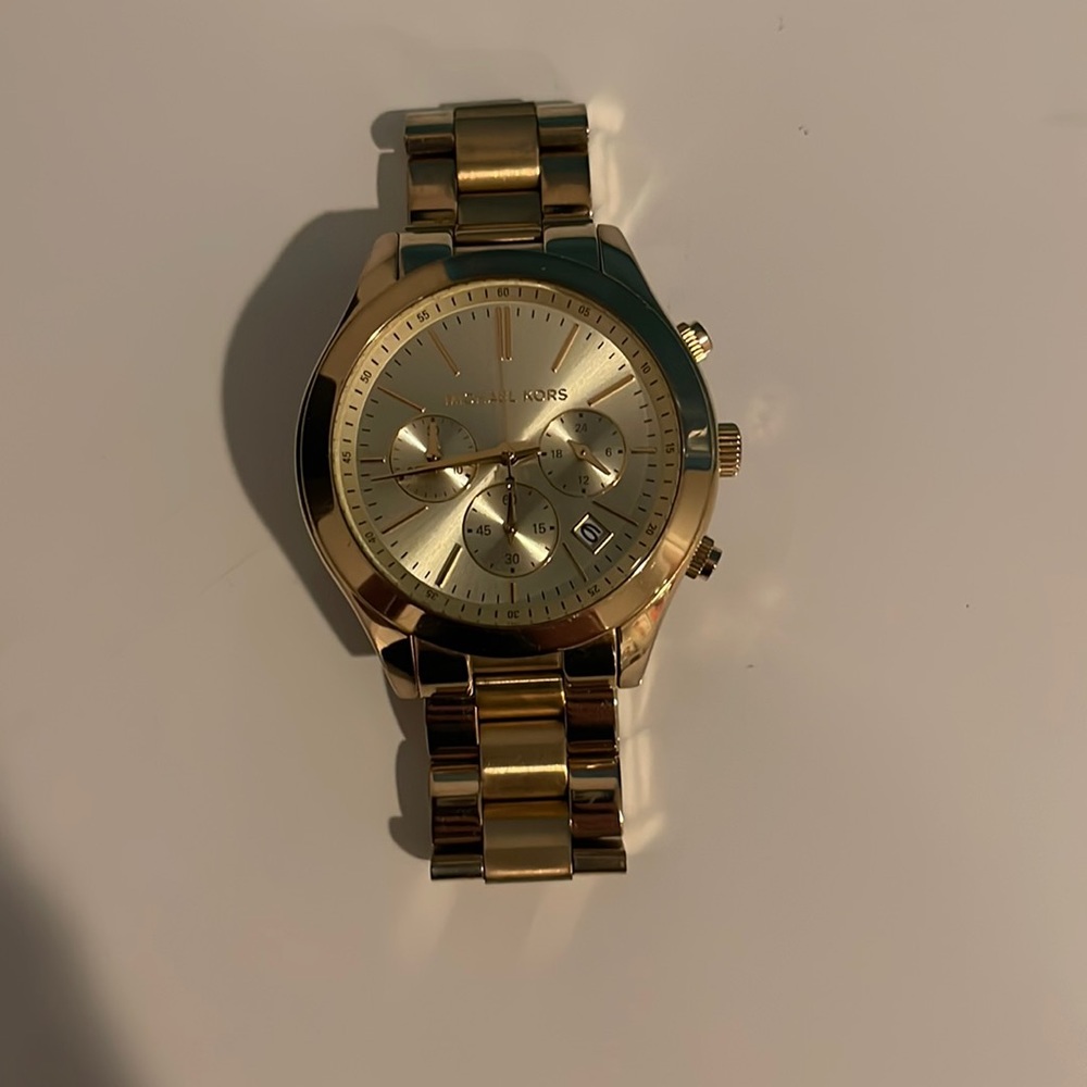 Michael Kors women’s gold watch